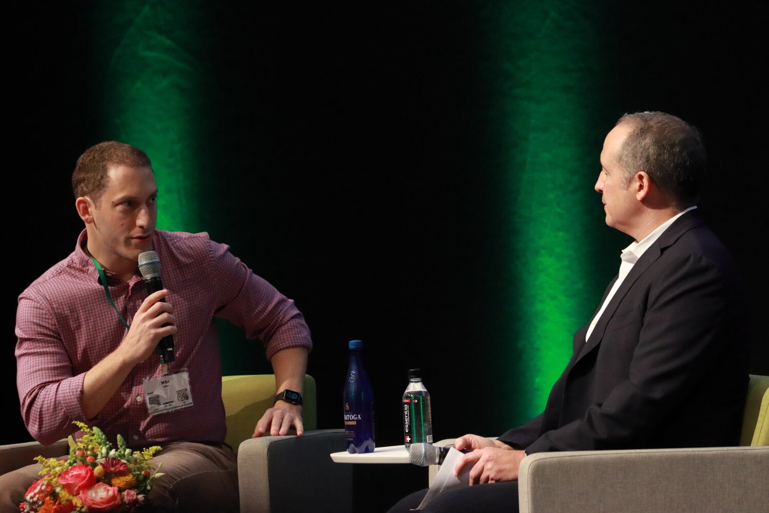 Two speakers in conversation on the OverdriveAI 2025 stage